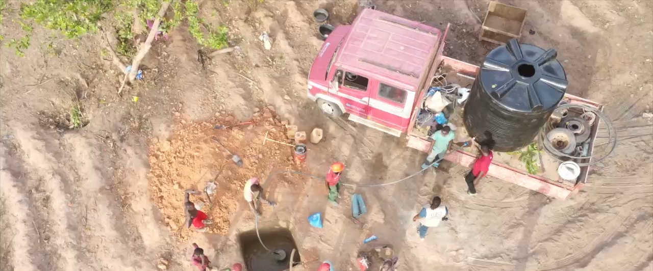 Aerial view of the team drilling a borehole