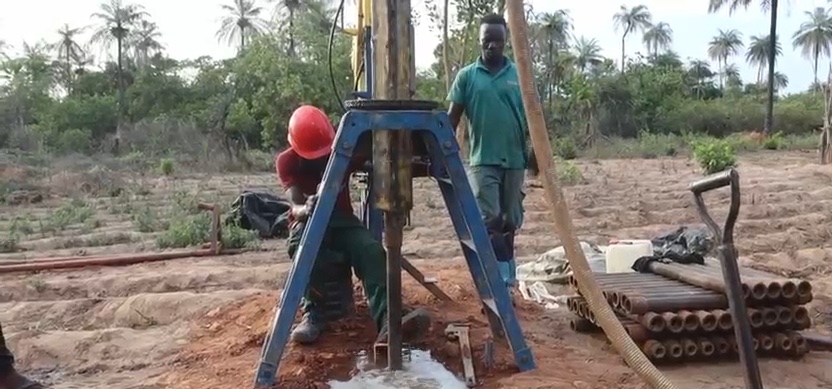 Water rising from a newly drilled borehole